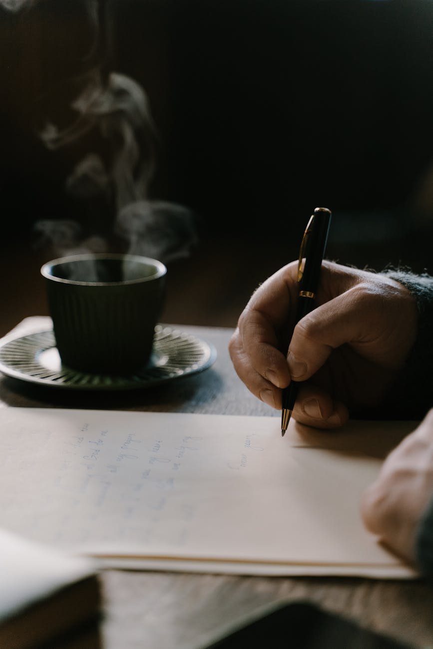 a person making a handwritten letter